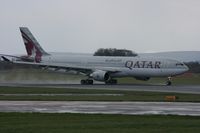 A7-AEJ @ EGCC - Taken at Manchester Airport on a typical showery April day - by Steve Staunton