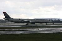 N278AY @ EGCC - Taken at Manchester Airport on a typical showery April day - by Steve Staunton