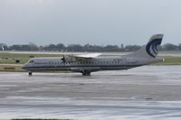EI-REA @ EGCC - Taken at Manchester Airport on a typical showery April day - by Steve Staunton