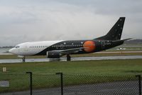 G-ZAPW @ EGCC - Taken at Manchester Airport on a typical showery April day - by Steve Staunton