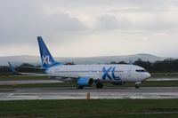 G-XLAK @ EGCC - Taken at Manchester Airport on a typical showery April day - by Steve Staunton