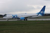 G-XLAK @ EGCC - Taken at Manchester Airport on a typical showery April day - by Steve Staunton