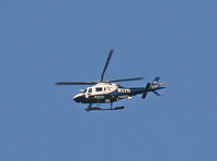N315PD - A NYPD chopper keeps check during the terrible fire at the old Deutsche Bank building. - by Daniel L. Berek