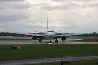 G-OOAN @ EGCC - Taken at Manchester Airport on a typical showery April day - by Steve Staunton