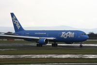 C-GZUM @ EGCC - Taken at Manchester Airport on a typical showery April day - by Steve Staunton