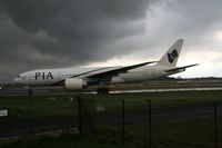 AP-BGZ @ EGCC - Taken at Manchester Airport on a typical showery April day - by Steve Staunton