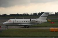 VP-CFT @ EGCC - Taken at Manchester Airport on a typical showery April day - by Steve Staunton
