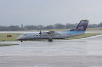 G-WOWE @ EGCC - Taken at Manchester Airport on a typical showery April day - by Steve Staunton