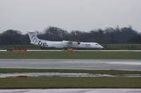 G-JEDU @ EGCC - Taken at Manchester Airport on a typical showery April day - by Steve Staunton