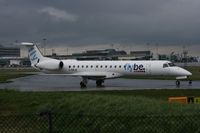 G-ERJB @ EGCC - Taken at Manchester Airport on a typical showery April day - by Steve Staunton
