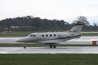 M-YSKY @ EGCC - Taken at Manchester Airport on a typical showery April day - by Steve Staunton