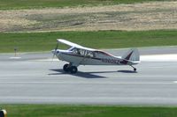 N9605Z @ CID - Departing Runway 13 from taxiway Alpha - by Glenn E. Chatfield
