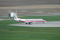 N820AE @ CID - Waiting in Runway 27 run-up pad for release to ORD - by Glenn E. Chatfield