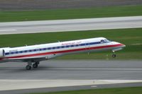 N645AE @ CID - Rotating on take off roll runway 31 - by Glenn E. Chatfield