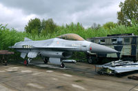FA-18 @ EBBE - In 2006 this F-16 was moved from the Weelde storage to Beauvechain to be put on display. Since its arrival nothing has happenend to this aircraft. It's still dismateled in a corner of the air base. - by Joop de Groot