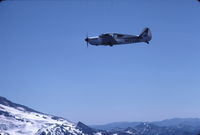 N6558N @ SPANAWAY,  - flying near Mt. Rainier, WA - by Bruce Alber
