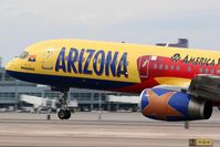 N901AW @ LAS - Nose shot of America West N901AW Arizona landing on RWY 25L. - by Dean Heald