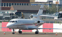 N900NS @ EGGW - Falcon 900EX parked on the Harrods Aviation ramp at Luton - by Terry Fletcher