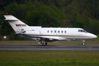 N863QS @ ORF - NetJets 2000 Raytheon Hawker 800XP N863QS (FLT EJA863) rolling out on RWY 23 after arrival from Concord Regional (KJQF) - Concord, NC. - by Dean Heald