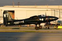 N909TC @ VNY - A recent acquisition to Clay Lacy's inventory, this rare Grumman F7F-3P Tigercat (G-51) NX909TC is seen here taking off from RWY 16R during some pattern work. - by Dean Heald