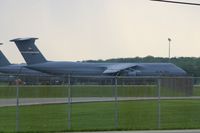 70-0447 @ FFO - C-5A parked on the ramp, as seen from the road through the fence