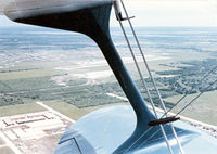 N9466H @ GKY - Beech Staggerwing - Flying downwind Arlington Municipal - by Zane Adams