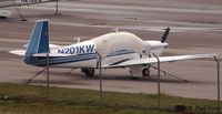 N201KW @ RDU - The stately tail of the Mooney - by Paul Perry