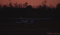 N758AQ @ PVG - Sunset arrival, before the field lights came on - by Paul Perry