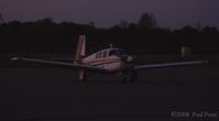 N9564M @ PVG - Loosing the light on this Mooney - by Paul Perry