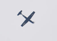 05-3793 - Texan II Flight over Columbine High School, Littleton Colorado heading East. - by Bluedharma