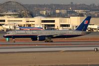 N598UA @ LAX - United Airlines N598UA (FLT UAL945) on Taxiway Tango after arrival on RWY 25L from Chicago O'Hare Int'l (KORD). - by Dean Heald