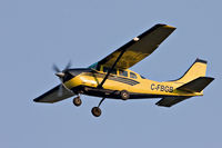 C-FBGB @ CYMO - Bushland Airways Cessna 206 above the Moose River at Moosonee, Ontario - by Paul Lantz