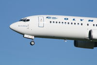 SX-BKC @ EBBR - arrival of flight OA145 to rwy 25L - by Daniel Vanderauwera