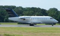 VP-BJA @ EGGW - CL604 Challenger taxies for departure from Luton - by Terry Fletcher