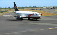 N828AL @ HNL - Aloha 1985 Boeing 737-236 taxying in happier times @ Honolulu, HI - by Steve Nation