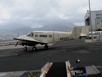 N933T @ HNL - Kamaka Air Inc (cargo) 1964 Beech H-18 taxying @ Honolulu, HI - by Steve Nation