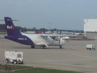 N916FX @ IND - Took this as our aircraft taxied by - by Devin R.