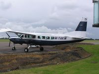 M-YAKW @ EGTC - Cessna 208 at Cranfield - by Simon Palmer