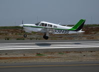 N38495 @ SQL - Nicely painted 1977 Piper PA-28R-201T touching down in smoky conditions @ San Carlos, CA - by Steve Nation