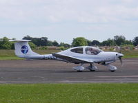 G-OCCF @ EGTC - returning to the apron after another lesson - by Chris Hall