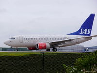 LN-RRZ @ EGCC - Scandinavian Airlines - by chrishall