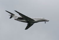 N966QS @ MCO - Net Jets Citation X - by Florida Metal