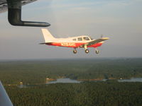 N284HG @ KMLJ - Good times with N284HG.  Formation flight over KMLJ. - by J. Michael Travis