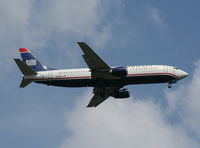N419US @ MCO - US Airways 737-400 arriving from CLT - by Florida Metal