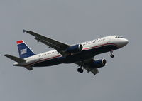N653AW @ MCO - US Airways A320 arriving from LAS - by Florida Metal