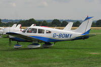 G-BOMY @ EGKH - Taxiing out from flight line at Lashenden/Headcorn - by Jeff Sexton