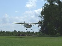 N6825M - Stinson 108-3 landing at it's home field. - by Terry L. Swann