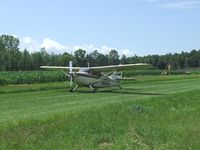 N6825M - Stinson taxing in to park at it's home field. - by Terry L. Swann