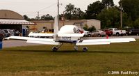 N856PB @ LBT - RV-10 on the grass - by Paul Perry
