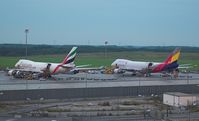 HL7436 @ LOWW - Asiana Airlines Cargo+Emirates Cargo - by Delta Kilo